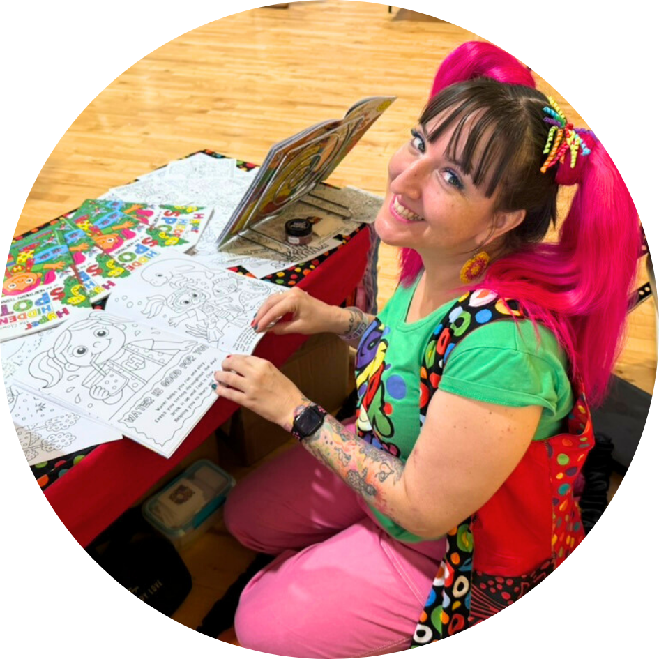 Local author Hyper the Clown with her colouring book.